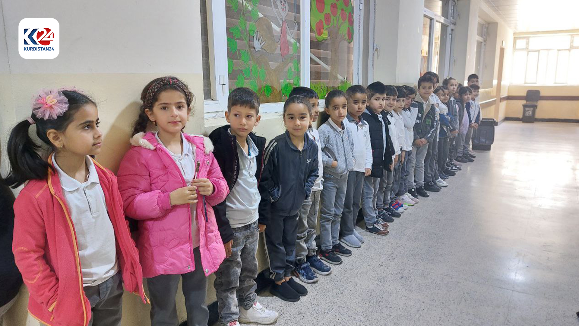 Waiting in line, the children's vaccination against the measles. 